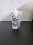 Genuine Mopar Threebond Rtv Gray Sealer 68082860AB. Fixed Price $14.99.